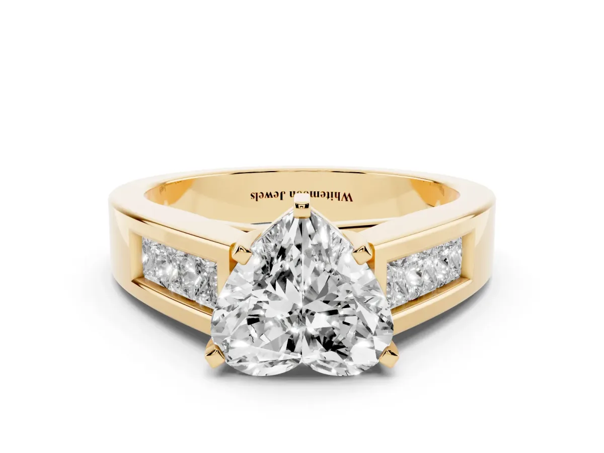 Heart Cut Cut Channel Set Solitaire Ring with Four-Prong Setting Yellow gold