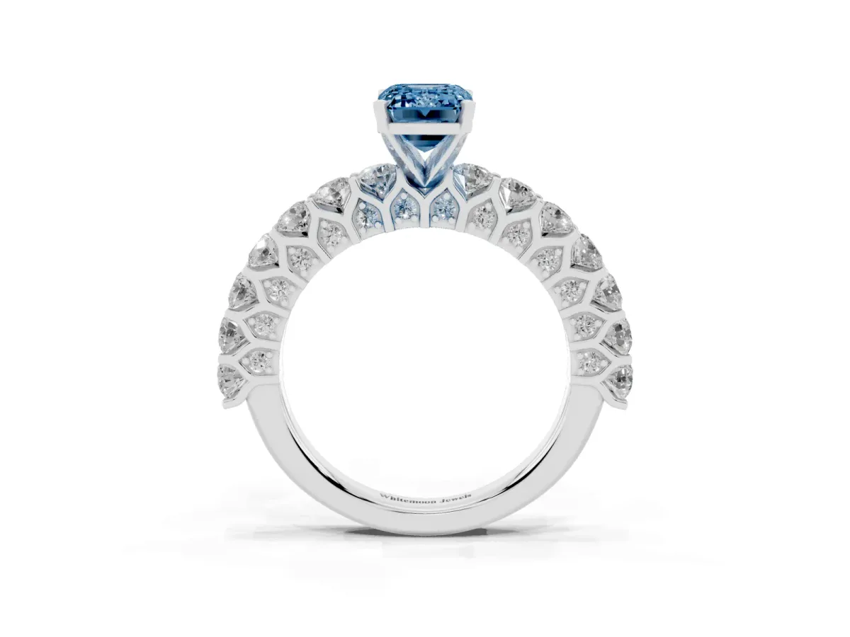 Fancy Blue Emerald Cut Diamond Solitaire Ring with Shared Prong Pavé Band and Four-Prong Setting Silver