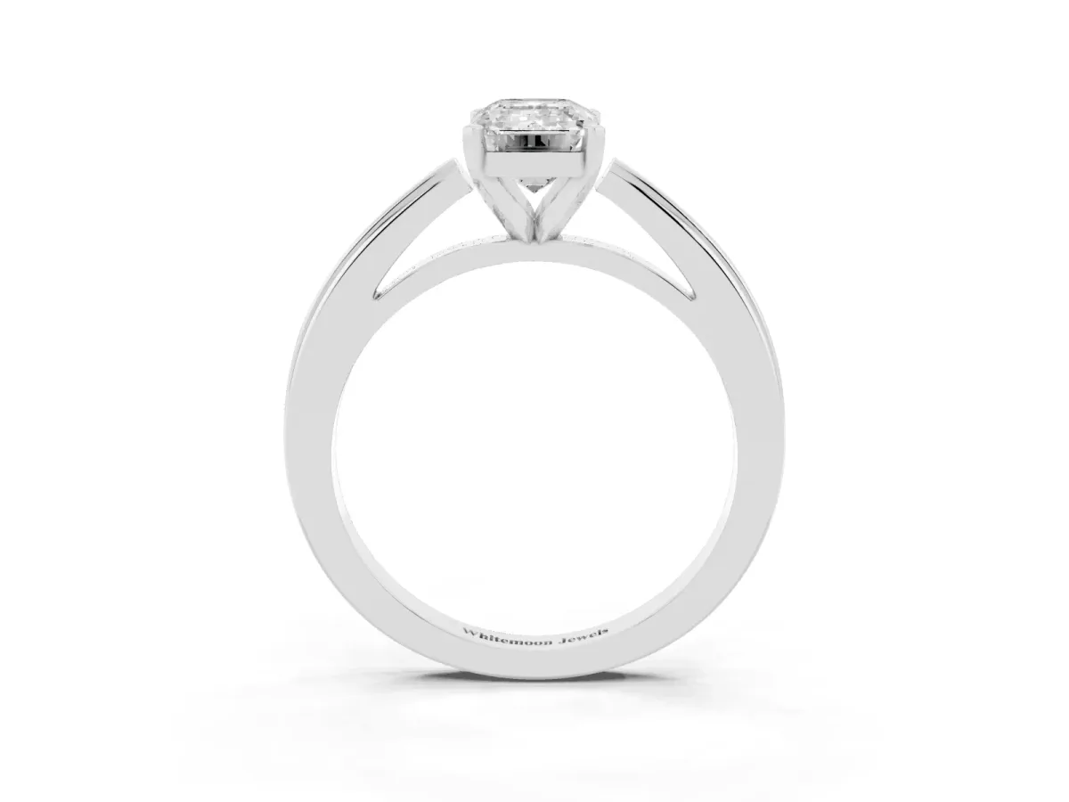 Emerald Cut Solitaire Diamond Ring with Four-Prong Setting and Classic Band Platinum