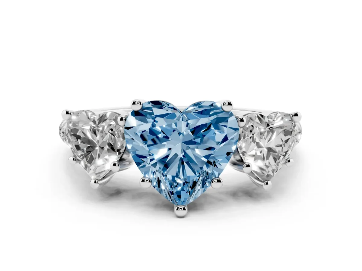 Fancy Blue Three-Stone Heart Cut Diamond Ring with Round Pavé Band and Prong Setting Silver