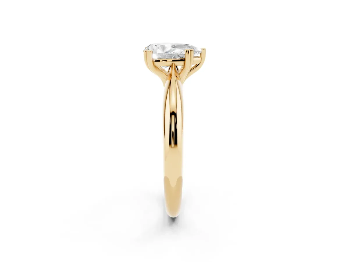 Pear Cut Cut Solitaire Engagement Ring with Tapered Band and Four-Prong Setting Yellow gold