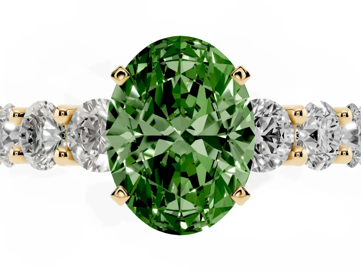Fancy Green Oval Cut Diamond Prong Setting with Side Stones on a Pave Band Yellow gold