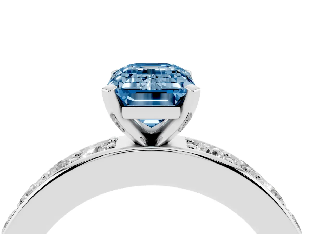 Fancy Blue Emerald Cut Diamond Engagement Ring with Channel Set Round Band and Prong Setting Silver