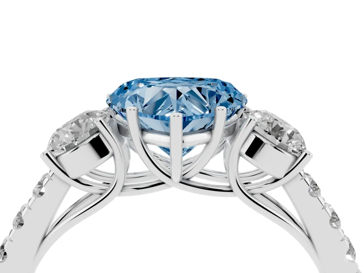 Fancy Blue Heart Cut Cut Diamond Three-Stone Ring with Round Side Stones and Pavé Band Platinum