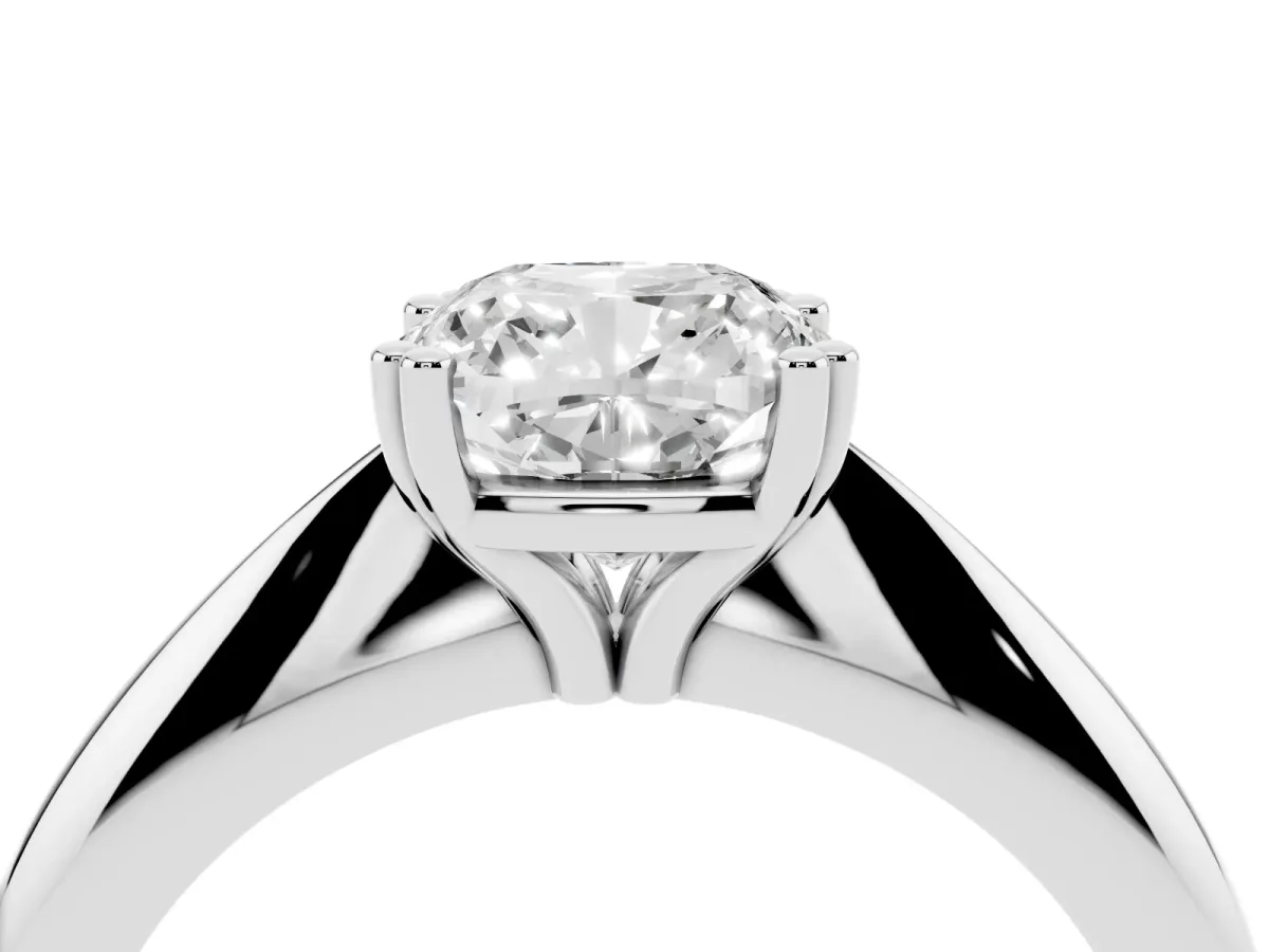 Cushion Cut Cut Solitaire Engagement Ring with Tapered Band and Four-Prong Setting Platinum