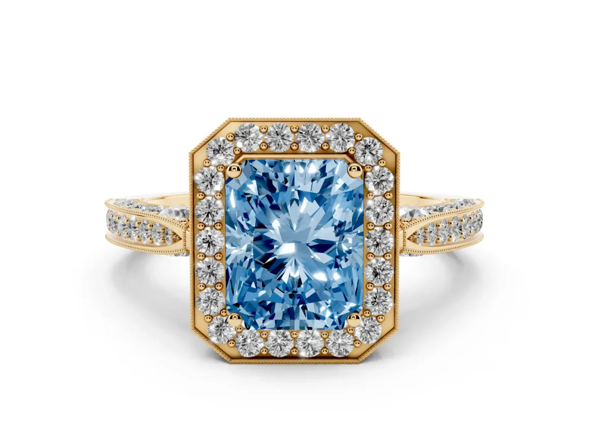 Fancy Blue Radiant Cut Halo Diamond Engagement Ring with Split Shank Band and Four-Prong Setting Yellow gold