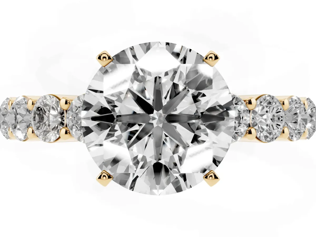 Round Cut Diamond Solitaire Ring with Shared Prong Round Side Stones Yellow gold