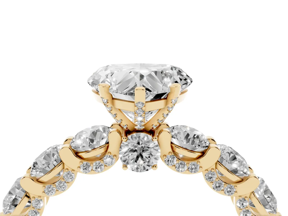 Heart Cut Diamond Side Stone Engagement Ring with Four-Prong Setting Yellow gold