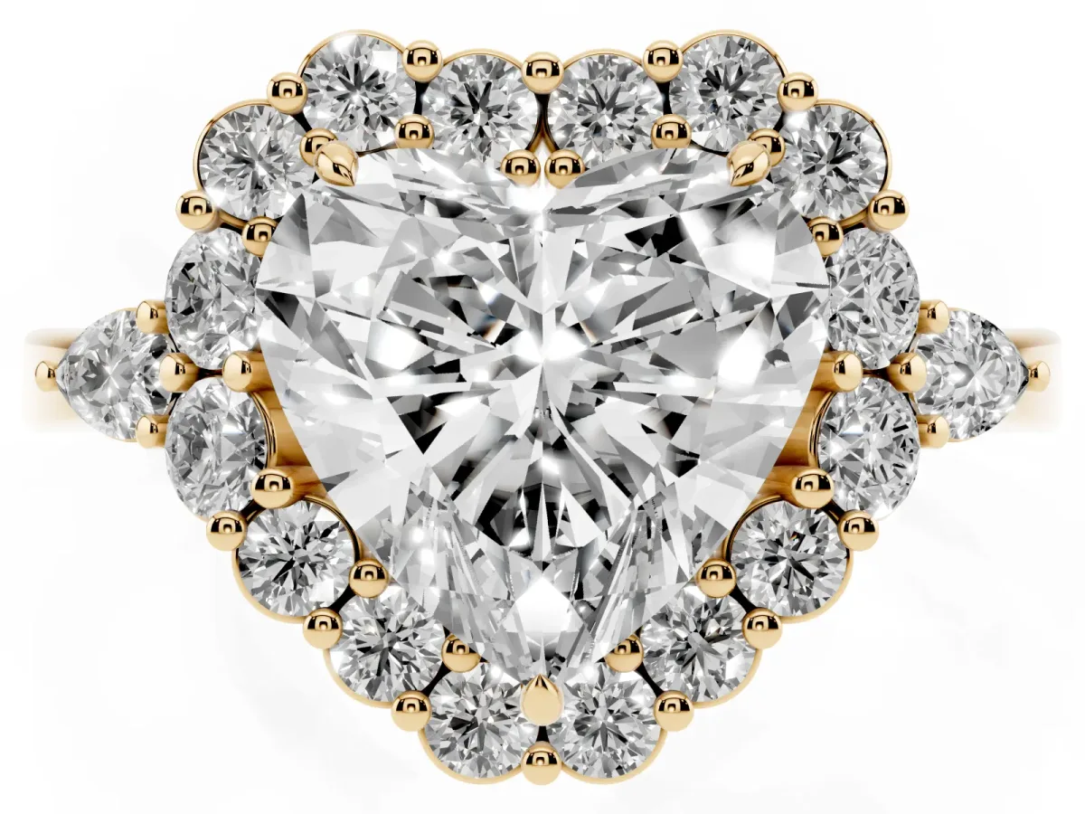 Heart Cut Diamond Halo Ring with Pear Side Stones and Prong Setting Yellow gold