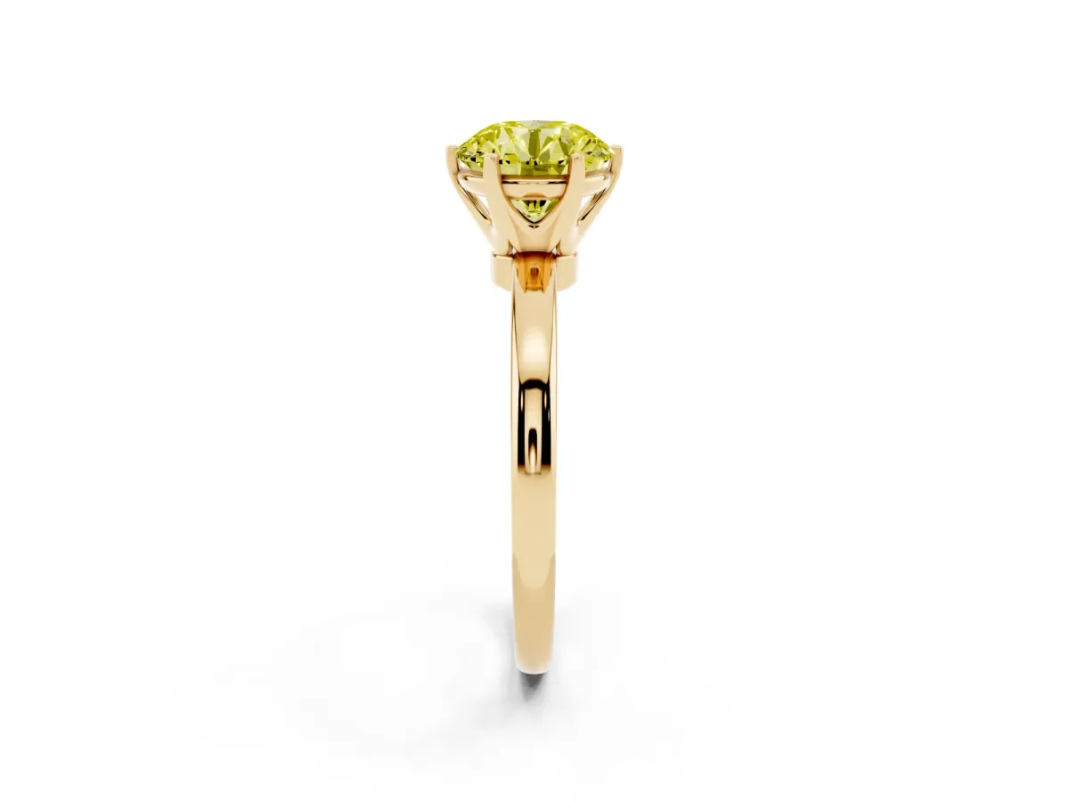 Fancy Yellow Round Cut Solitaire Diamond Ring with Six-Prong Setting on a Classic Band Yellow gold