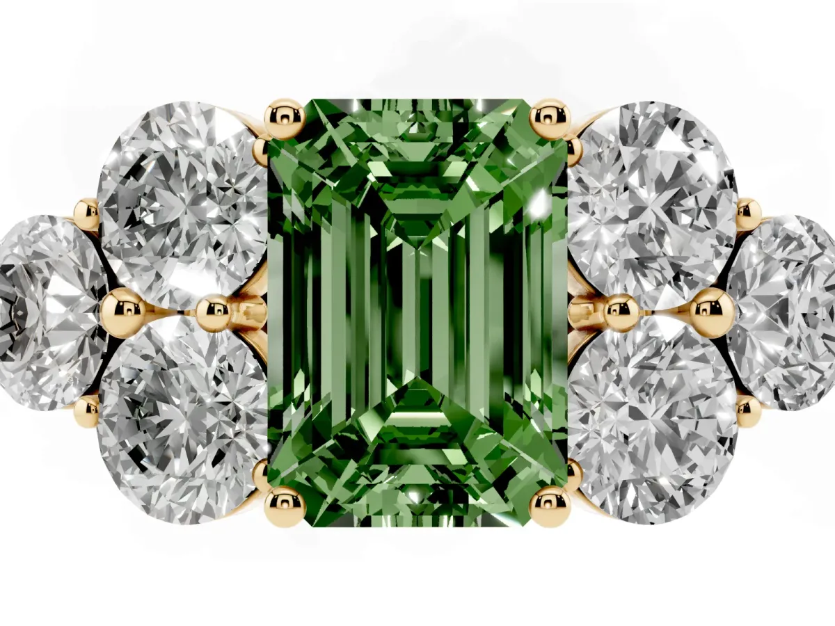 Fancy Green Emerald Cut Cut Diamond Cluster Ring with Round Accent Stones and Prong Setting on a Classic Band Yellow gold