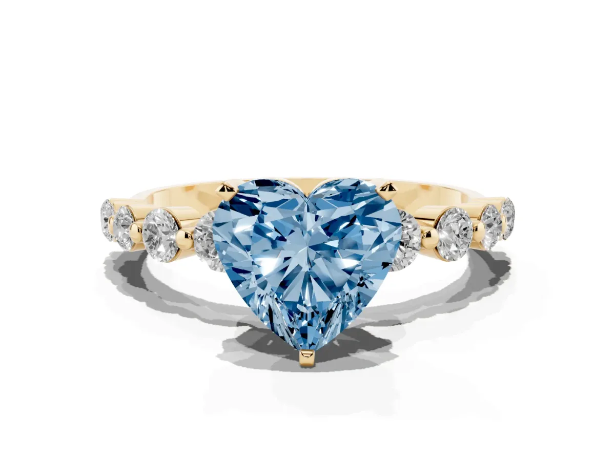 Fancy Blue Heart Cut Solitaire Diamond Ring with Pave Band and Four-Prong Setting Yellow gold