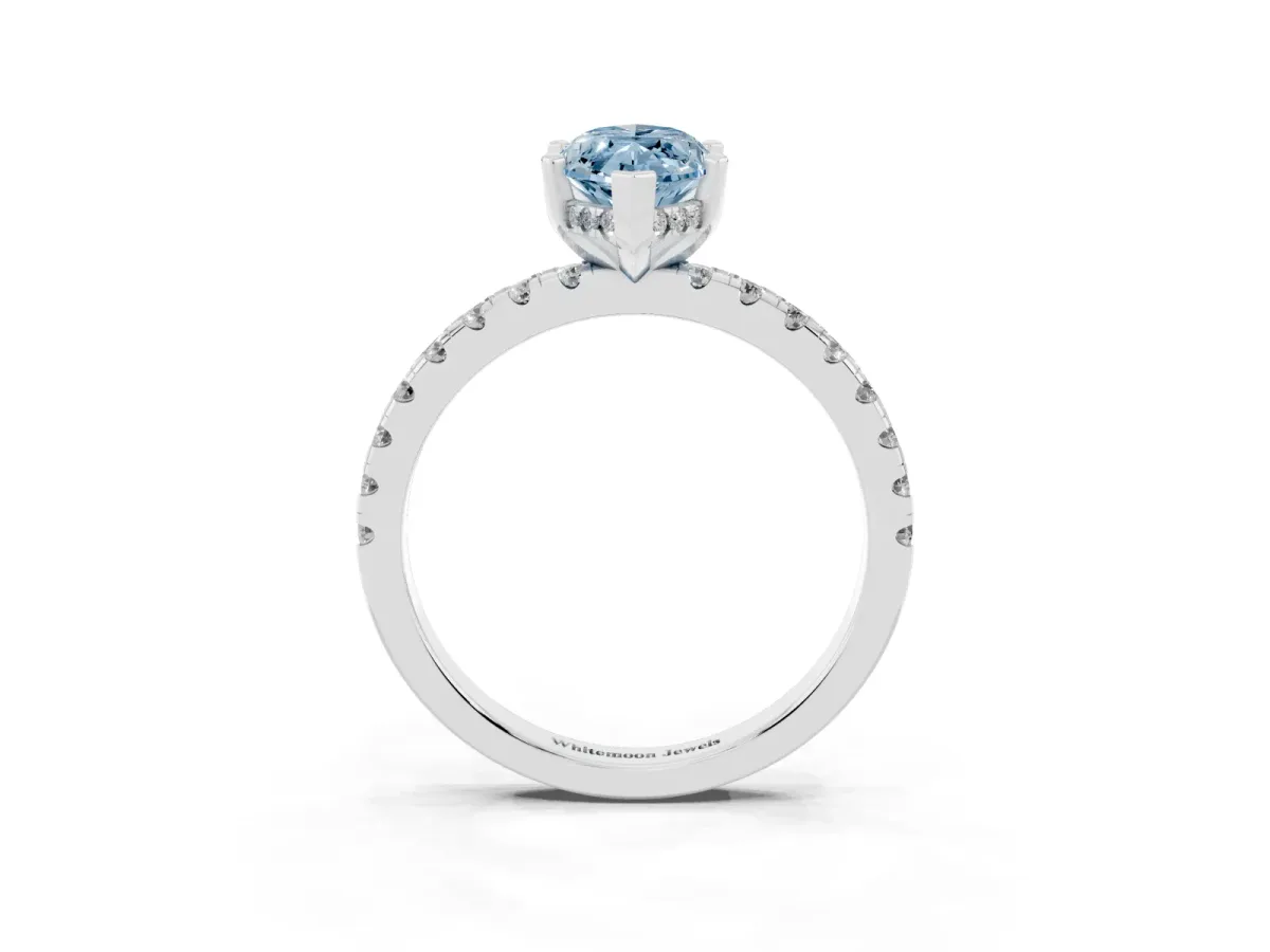 Fancy Blue Marquise Cut Diamond Solitaire Ring with Round Pavé Band and Four-Prong Setting Platinum