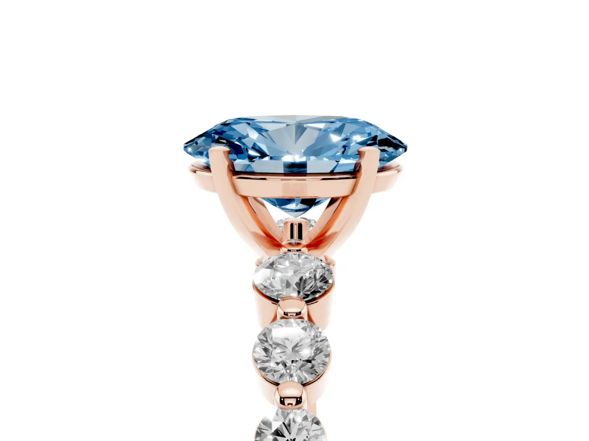 Fancy Blue Oval Cut Solitaire Diamond Ring with Pave Band and Four-Prong Setting Rose gold