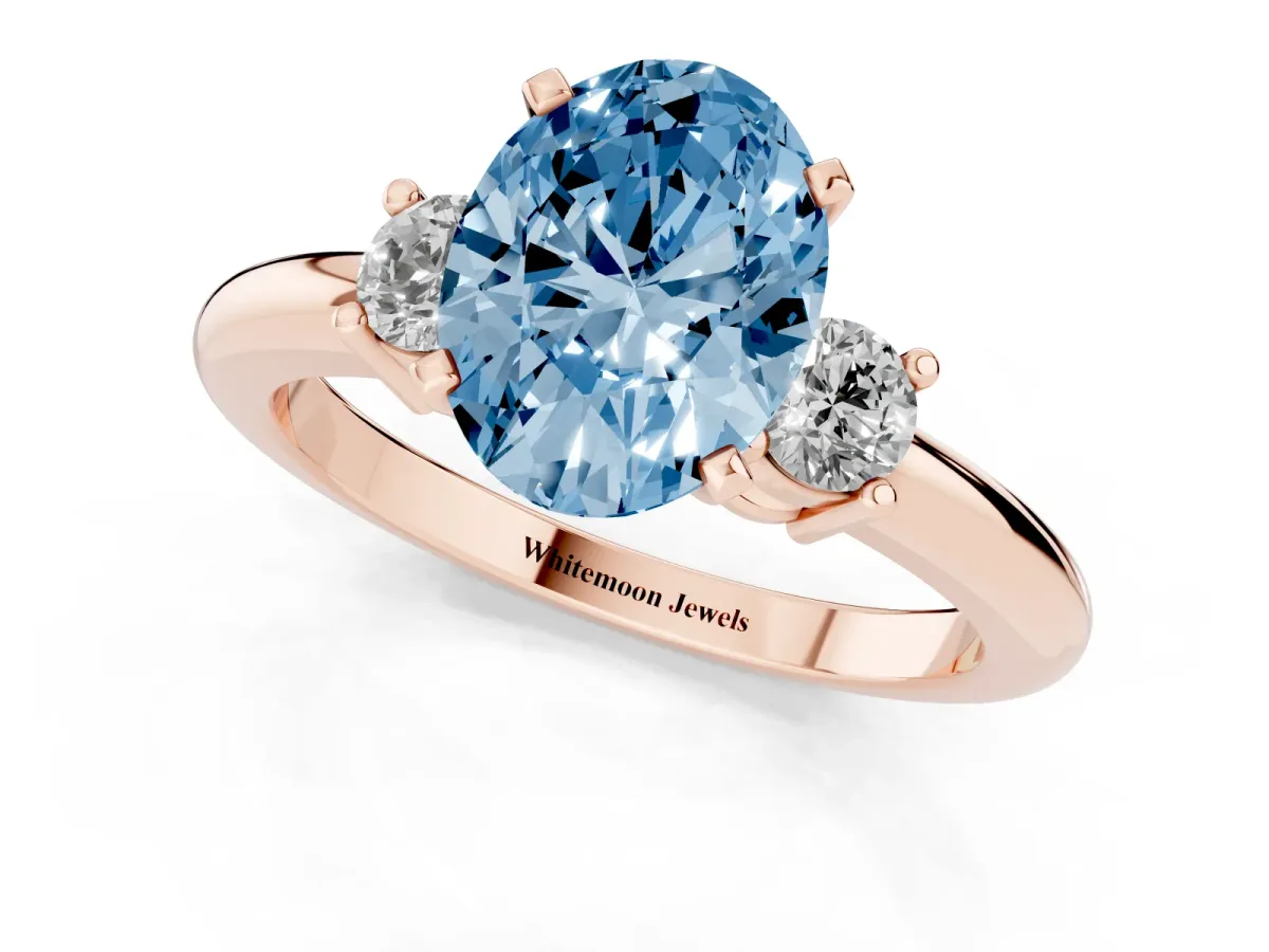 Fancy Blue Three-Stone Oval Cut Cut Diamond Solitaire with Prong Setting and Classic Band Rose gold