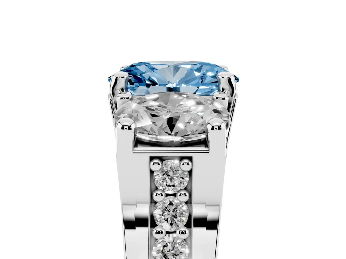 Fancy Blue Oval Cut Diamond Three-Stone Ring with Channel Set Band and Four-Prong Setting Silver