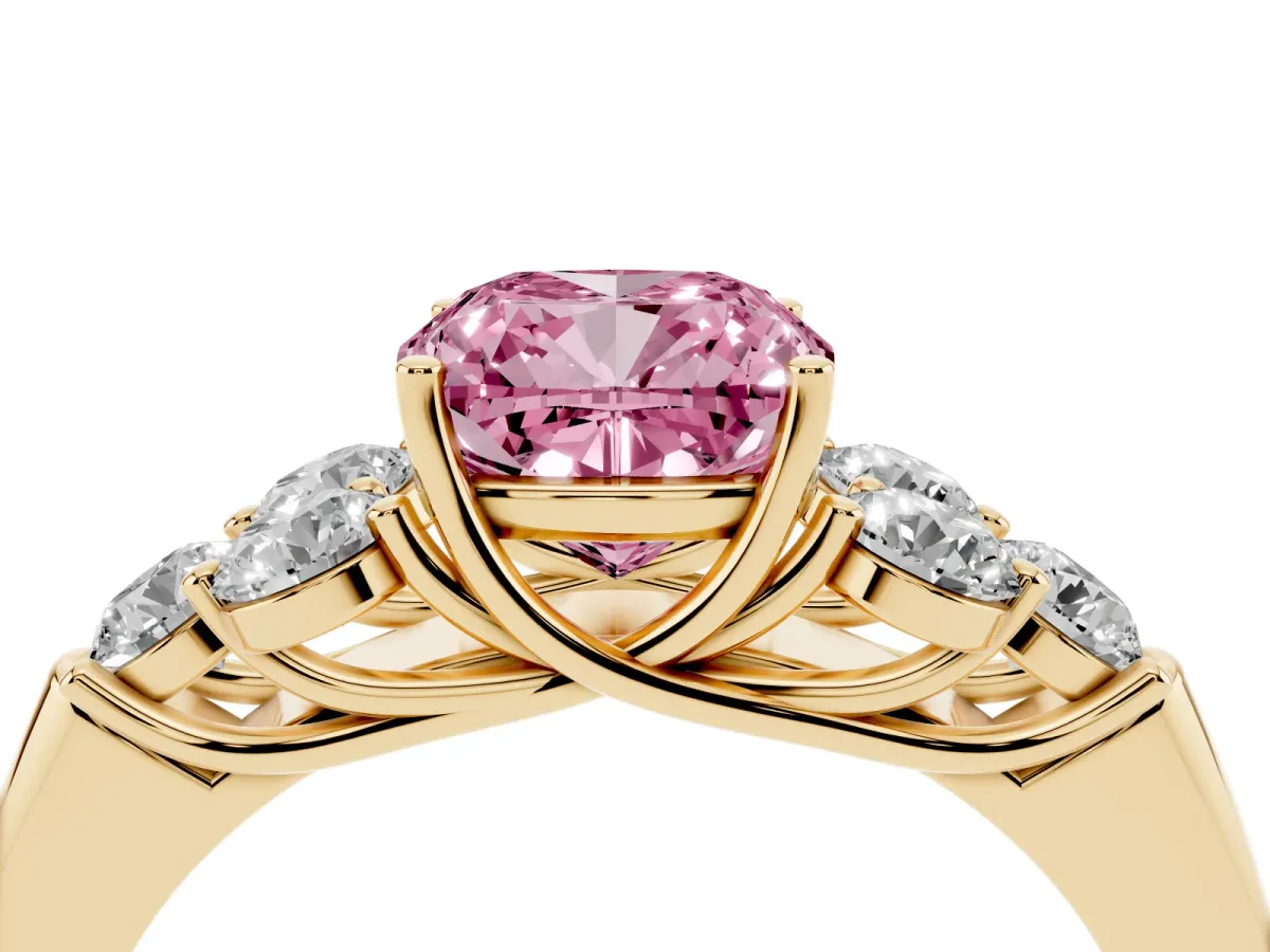 Fancy Pink Cushion Cut Cut Diamond Cluster Ring with Round Accent Stones and Prong Setting on a Classic Band Yellow gold