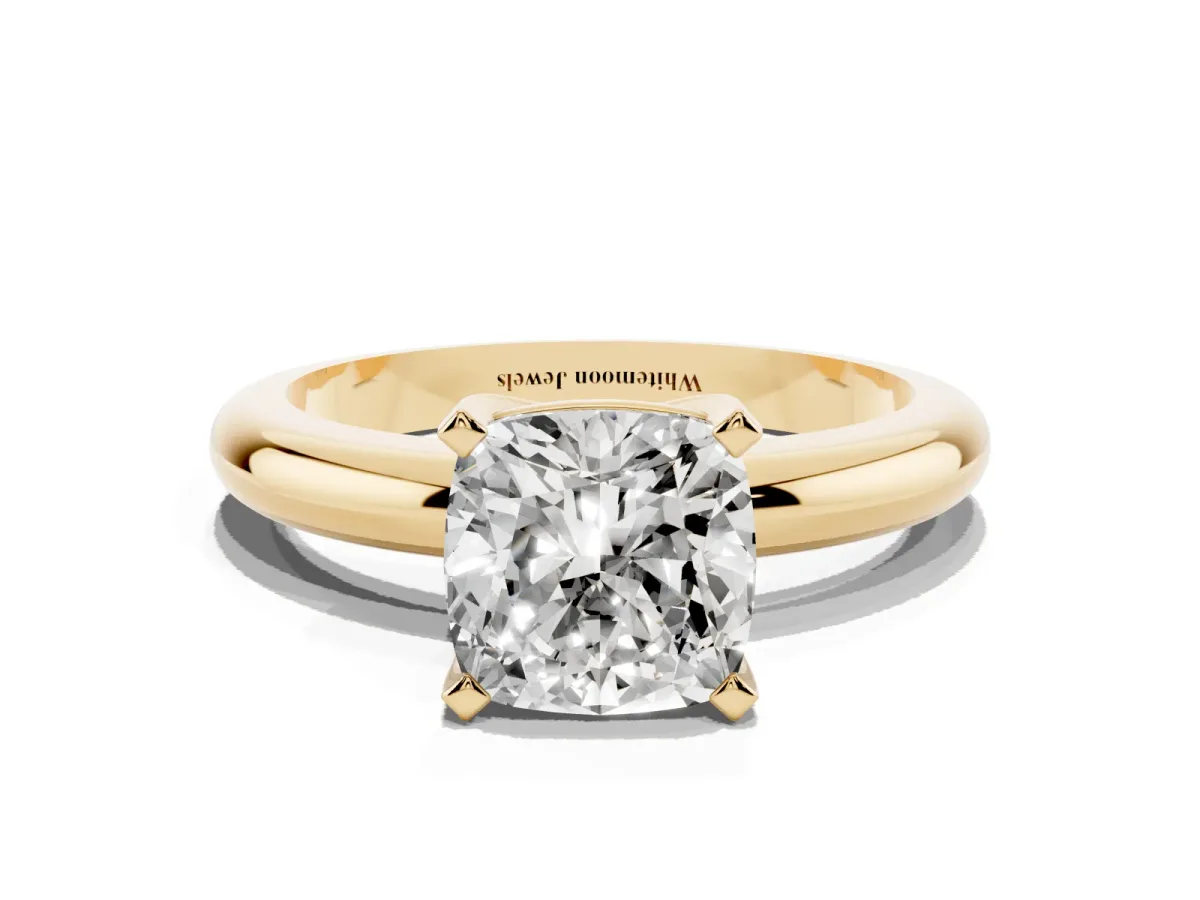 Cushion Cut Diamond Solitaire Engagement Ring with Round Band and Four-Prong Setting Yellow gold