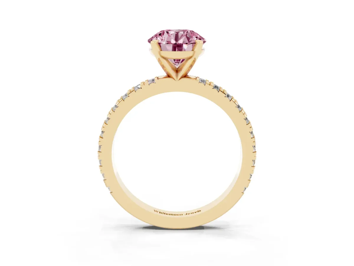 Fancy Pink Round Cut Diamond Pavé Band Solitaire with Four-Prong Setting Yellow gold