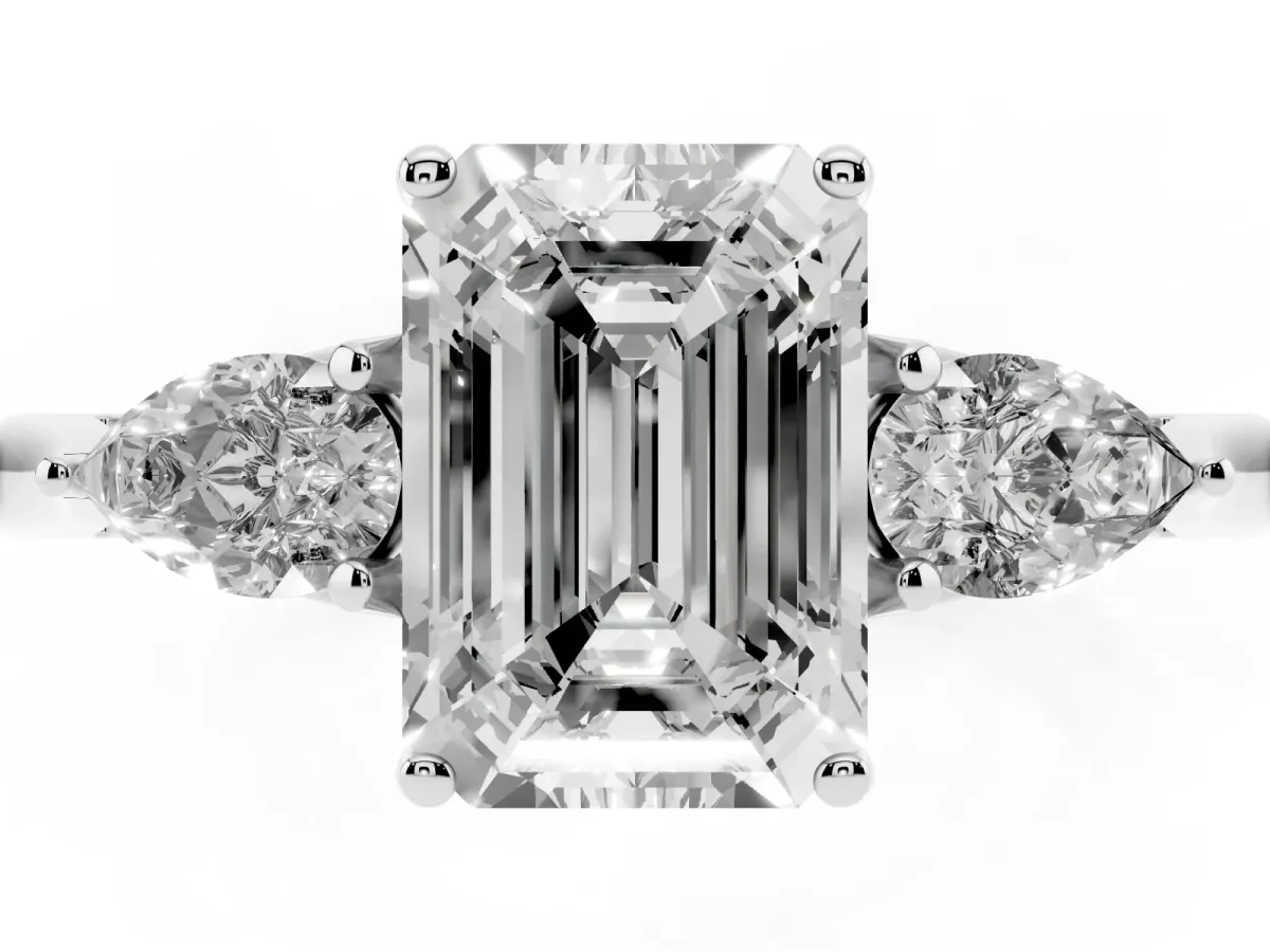 Emerald Cut Diamond Three-Stone Ring with Pear Side Stones and Prong Setting Silver