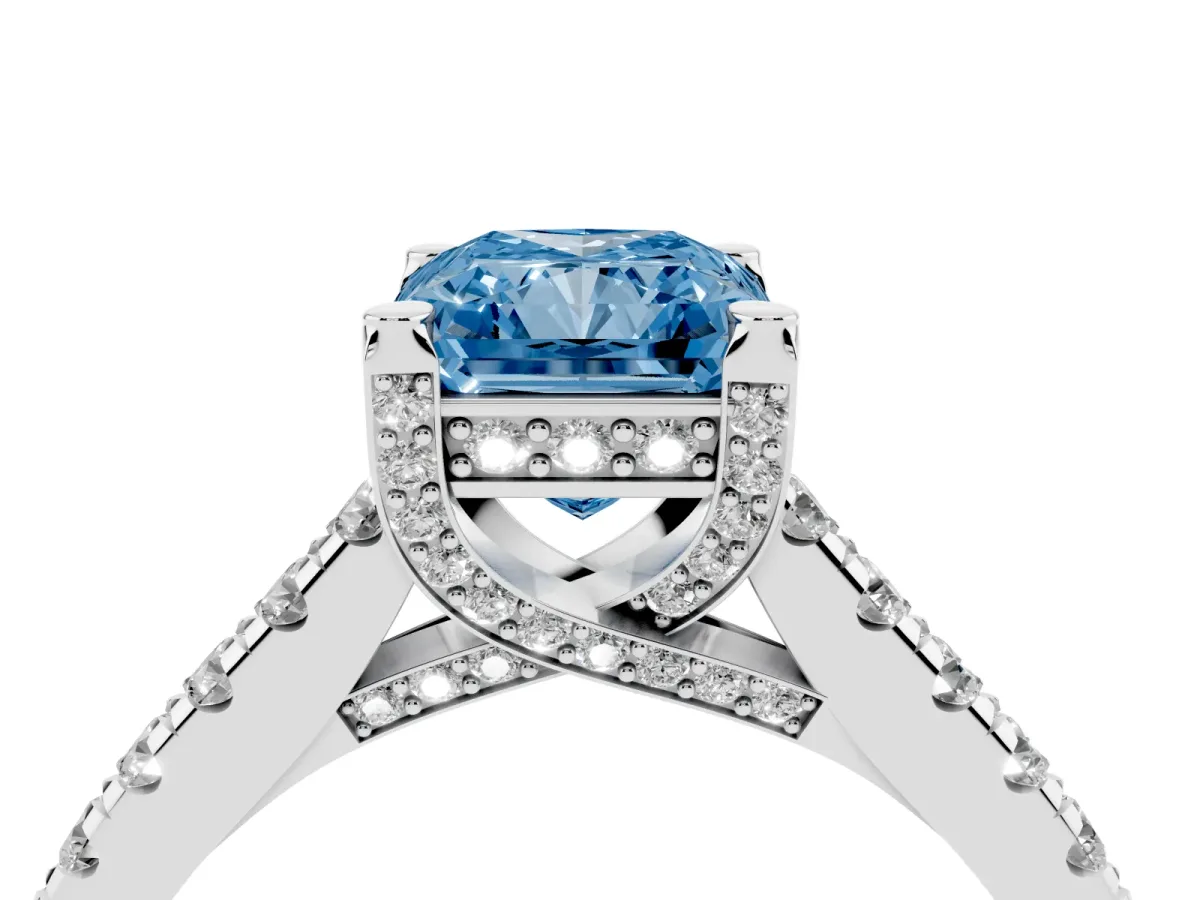 Fancy Blue Radiant Cut Brilliant Diamond Solitaire with Pavé Band and Four-Prong Setting Silver