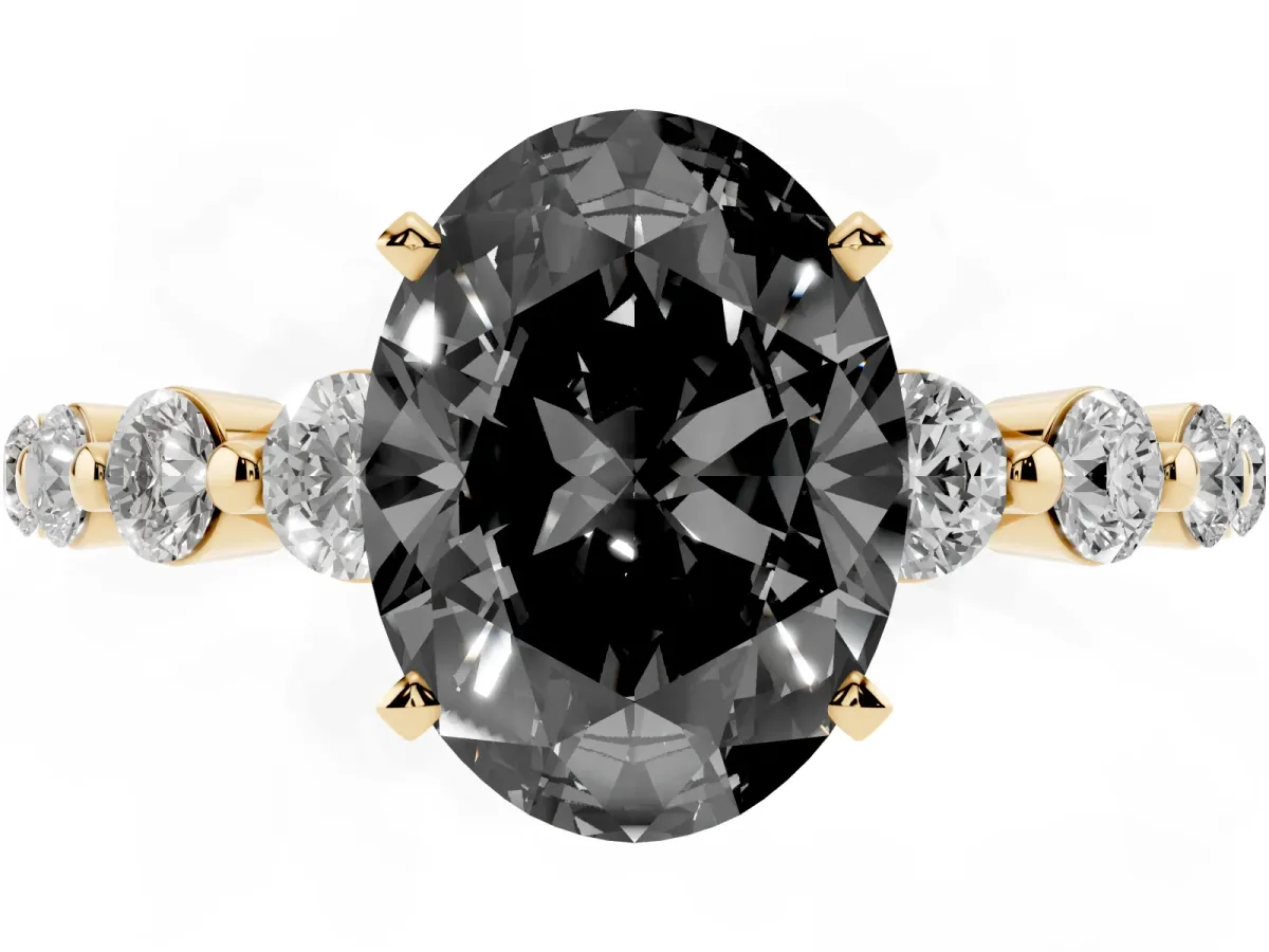 Fancy Black Oval Cut Solitaire Diamond Ring with Pave Band and Four-Prong Setting Yellow gold