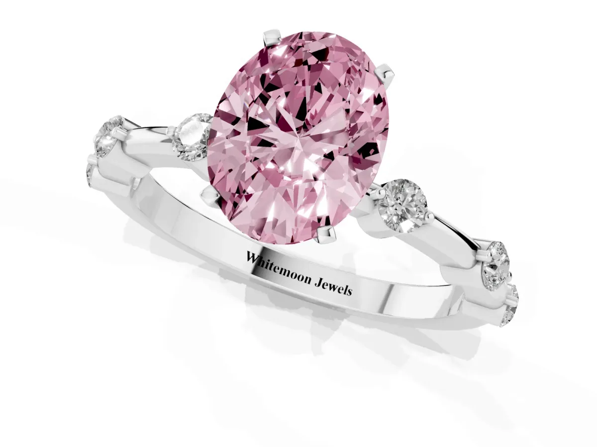 Fancy Pink Oval Cut Solitaire Diamond Ring with Bezel Set Side Stones and Prong Setting Silver