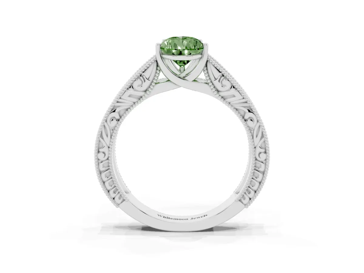 Fancy Green Pear Cut Diamond Solitaire Ring with Engraved Band and Four-Prong Setting Silver