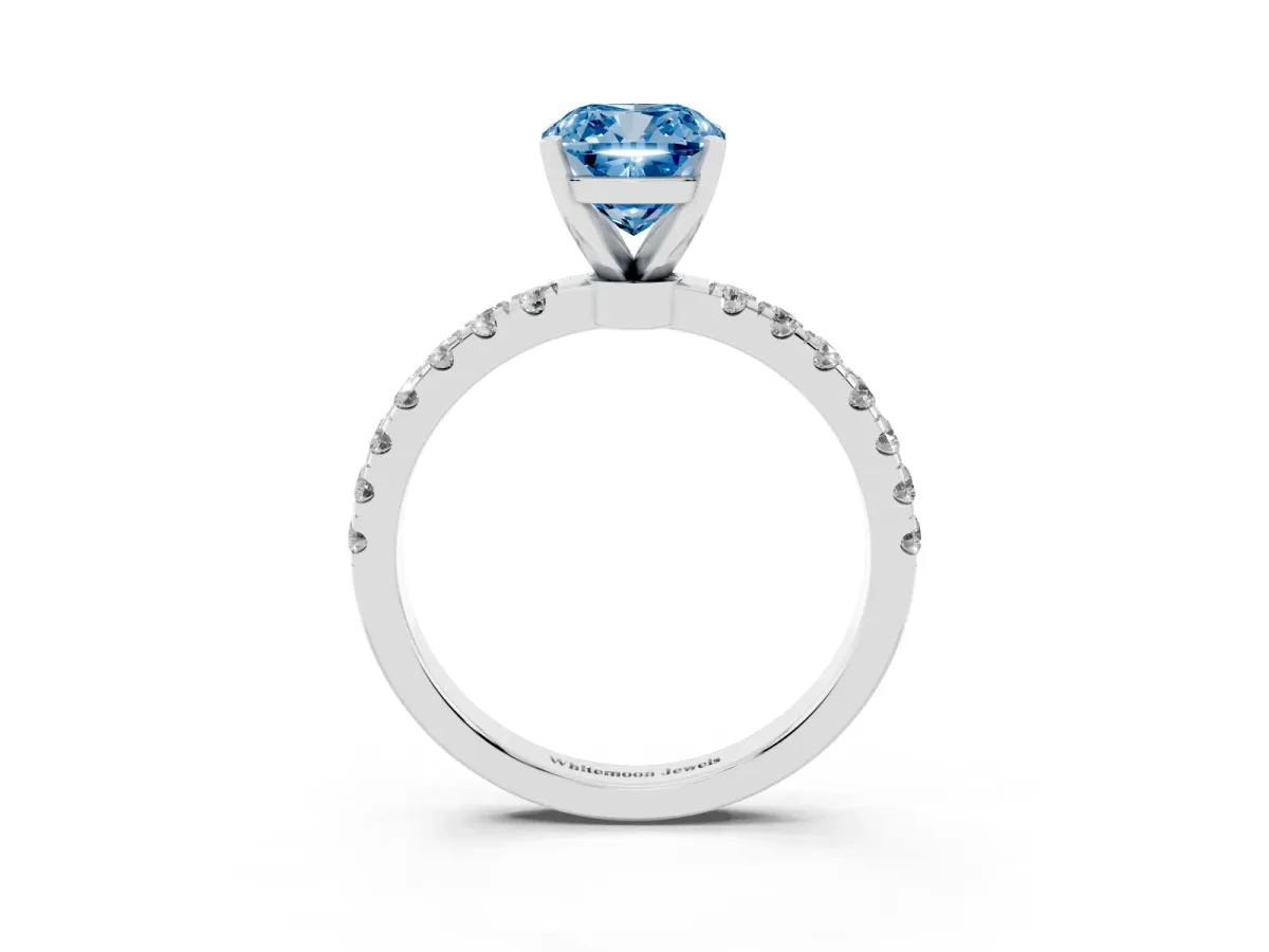 Fancy Blue Cushion Cut Diamond Solitaire Ring with Pavé Accents and Four-Prong Setting Silver