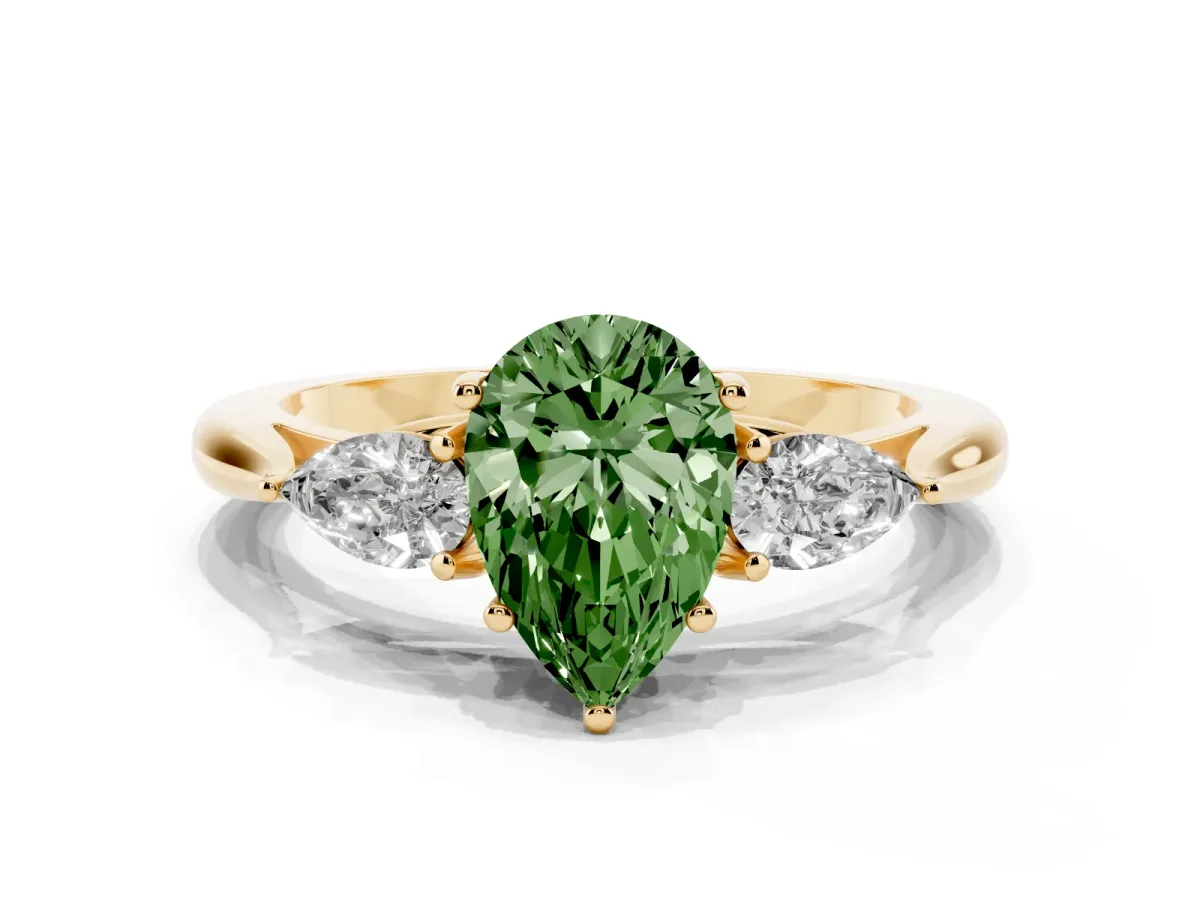 Fancy Green Three-Stone Pear Cut Diamond Ring with Pear Side Stones in Four-Prong Setting Yellow gold