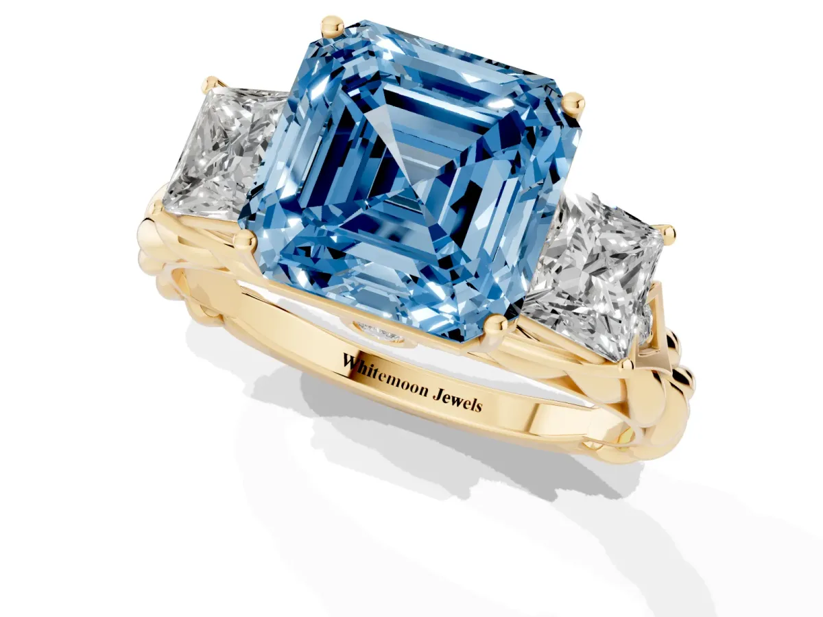 Fancy Blue Three-Stone Asscher Cut Diamond Braided Band Ring with Four-Prong Setting Yellow gold