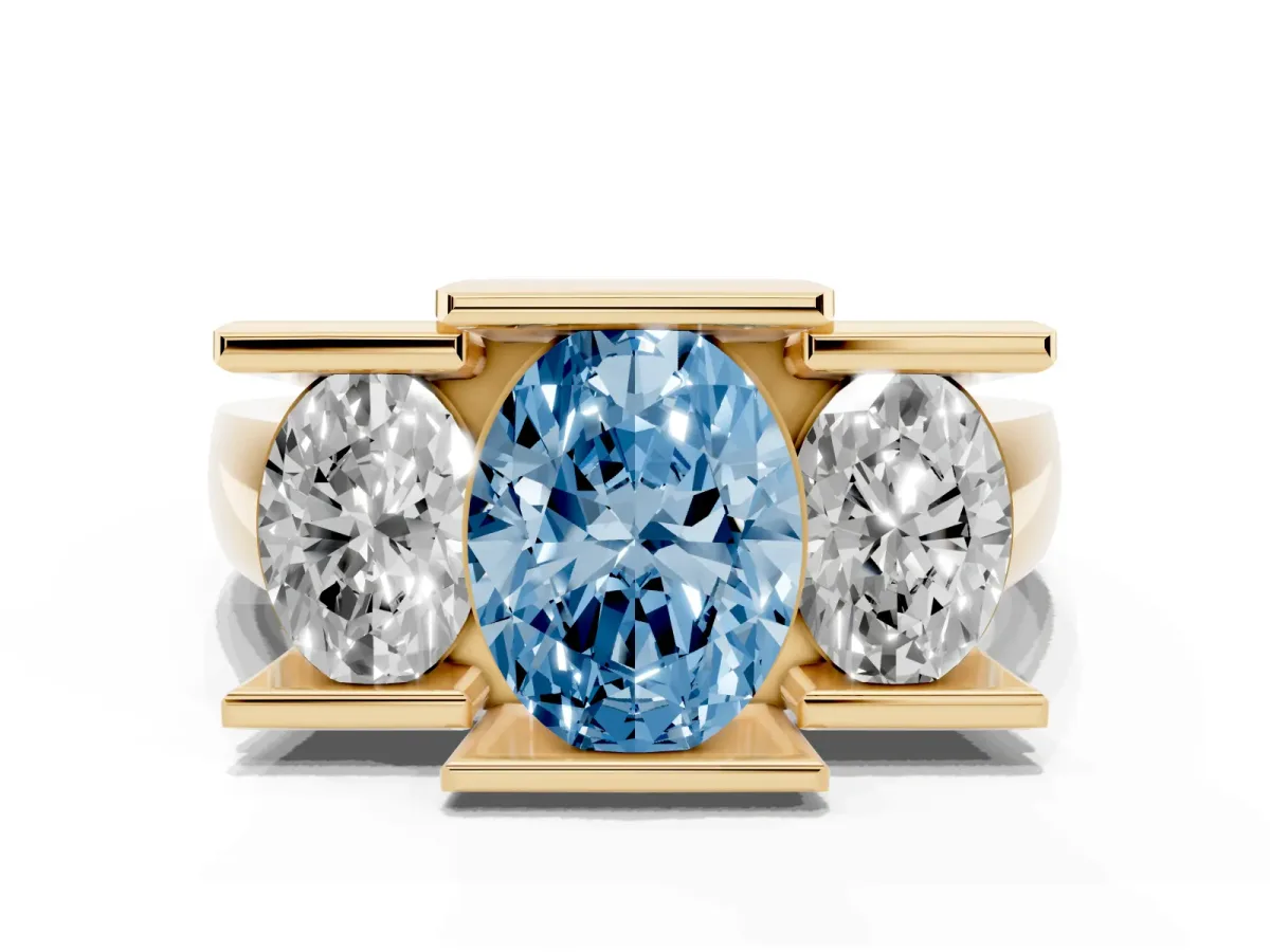 Fancy Blue Three Stone Oval Cut Cut Channel Set Diamond Ring Yellow gold