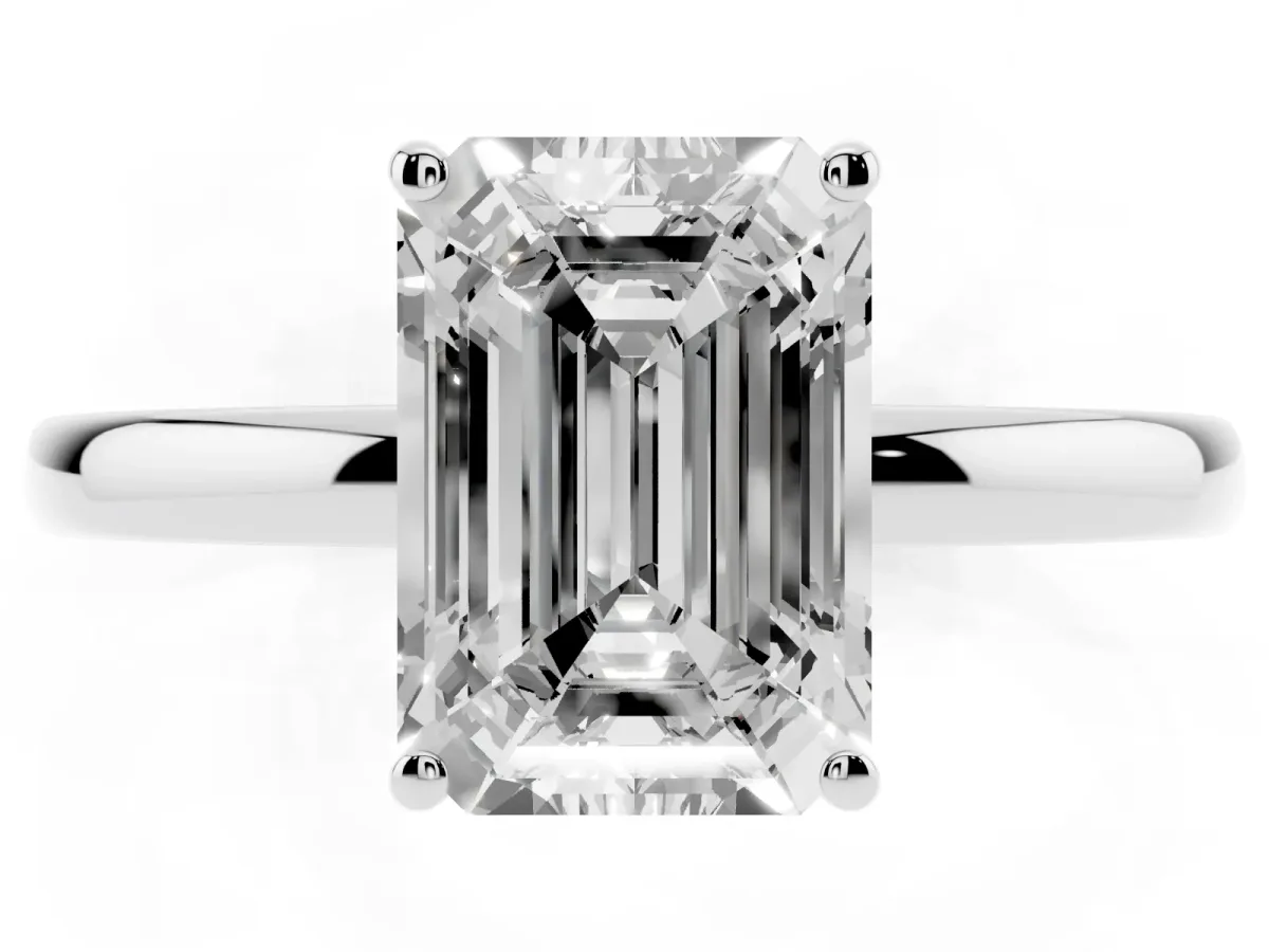 Emerald Cut Solitaire Diamond Ring with Prong Setting and Plain Band Silver