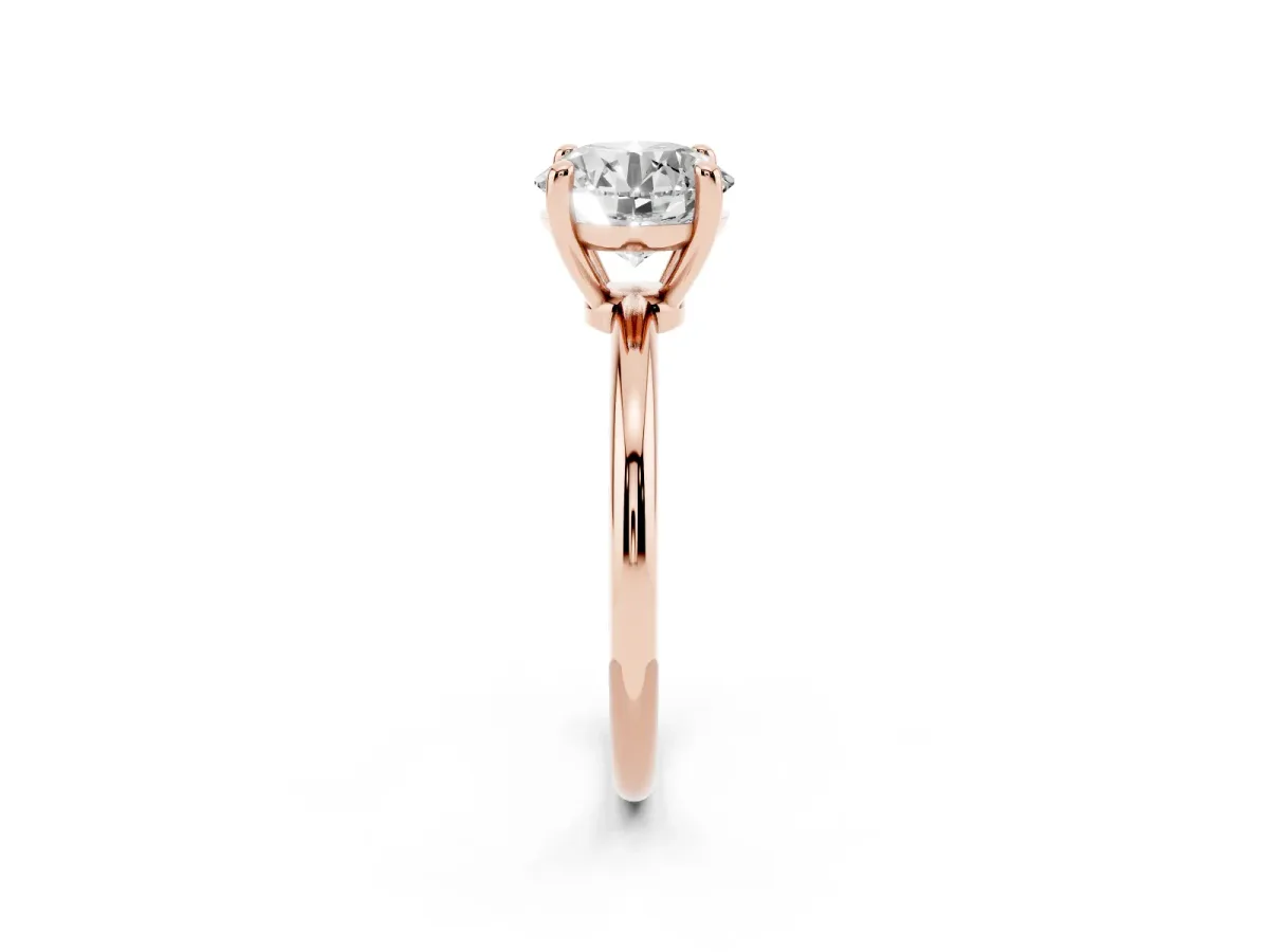 Round Cut Solitaire Diamond Ring with 4-Prong Setting on a Classic Band Rose gold
