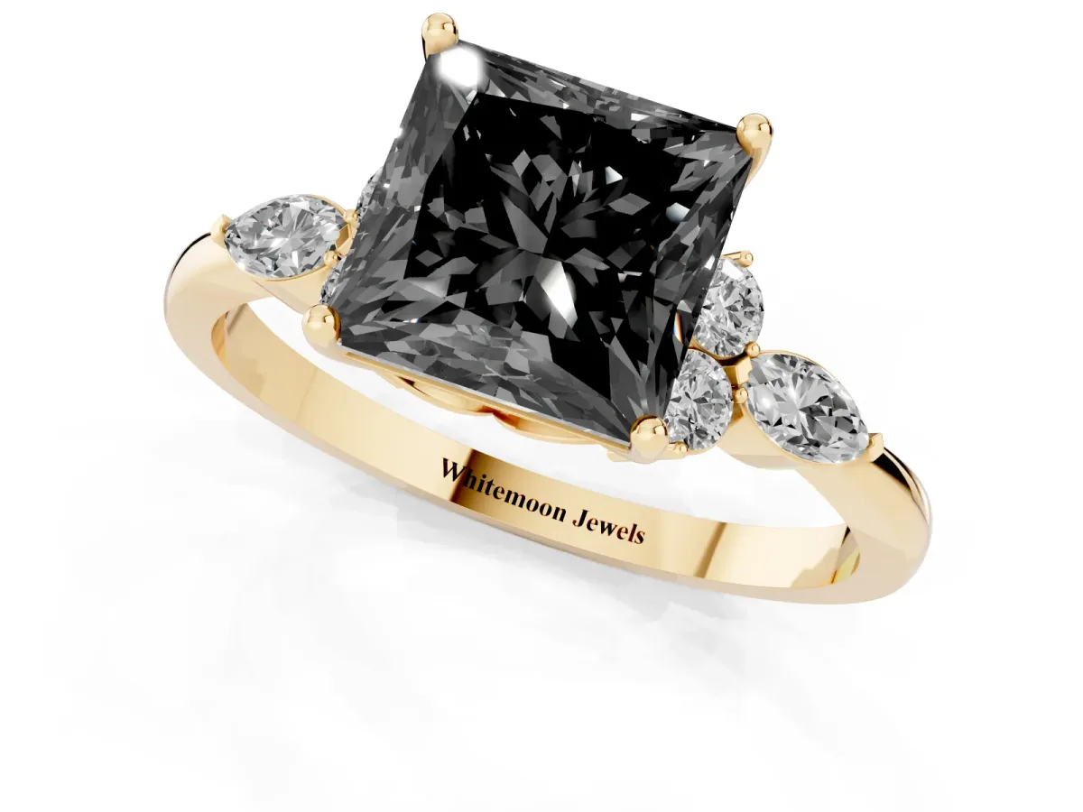 Fancy Black Princess Cut Brilliant Diamond Solitaire Ring with Pear Side Stones and Four-Prong Setting Yellow gold