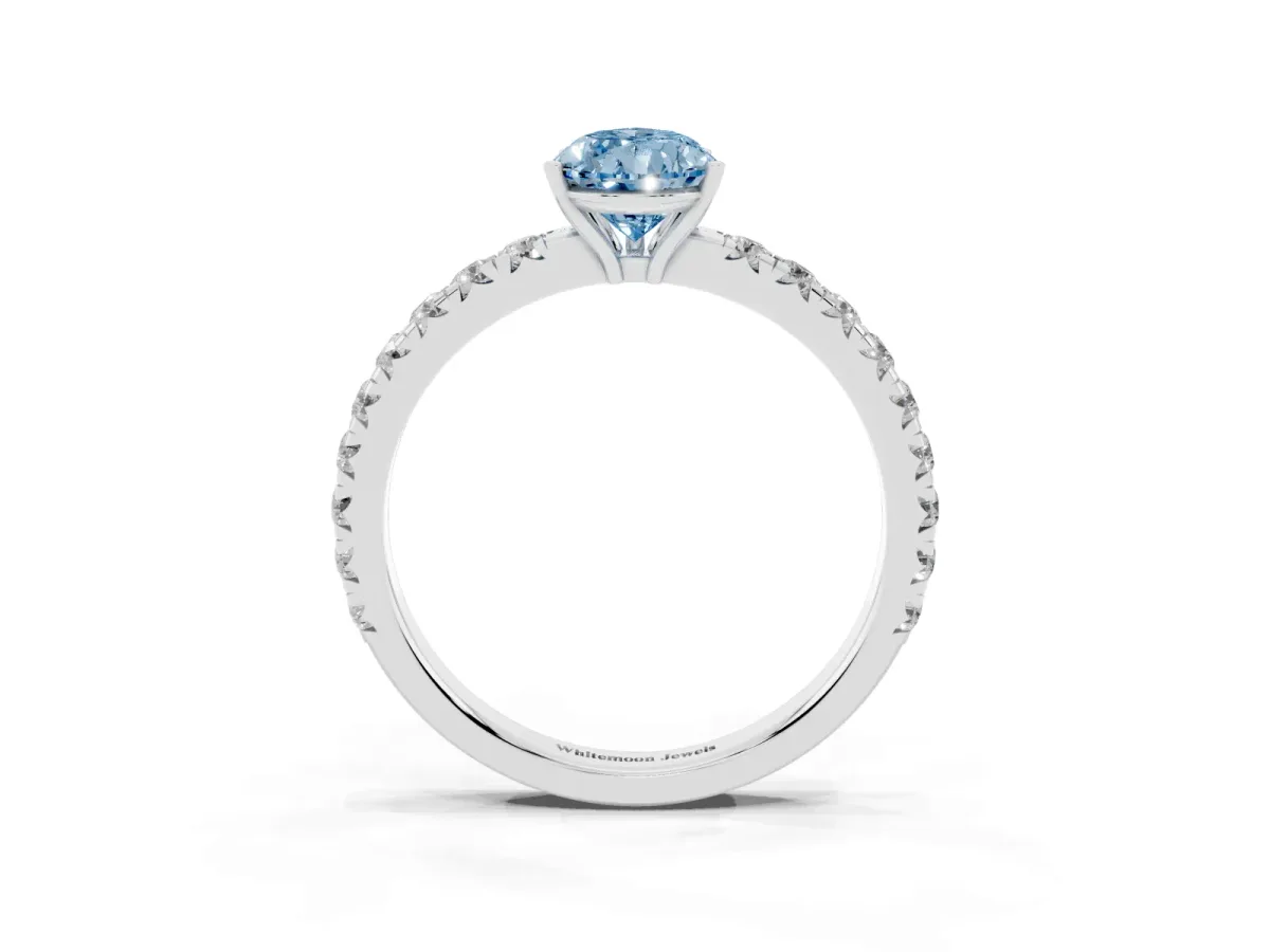 Fancy Blue Pear Cut Diamond Pavé Solitaire Engagement Ring with Four-Prong Setting Platinum
