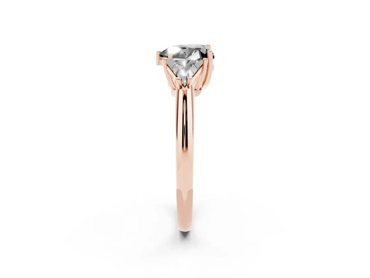 Fancy Black Three-Stone Heart Cut Diamond Engagement Ring with Trillion Side Stones and Prong Setting Rose gold