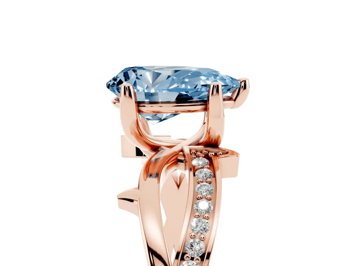 Fancy Blue Pear Cut Solitaire Twist Band with Pavé Accents and Four-Prong Setting Rose gold