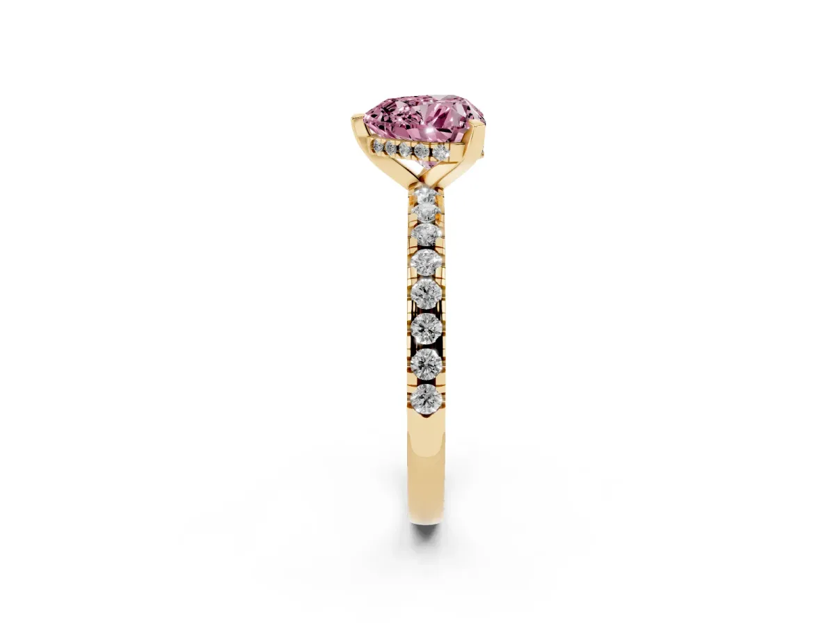 Fancy Pink Heart Cut Diamond Solitaire Ring with Round Pavé Band and Four-Prong Setting Yellow gold