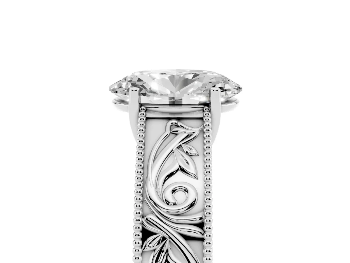 Oval Cut Diamond Solitaire Ring with Engraved Band and Four-Prong Setting Silver