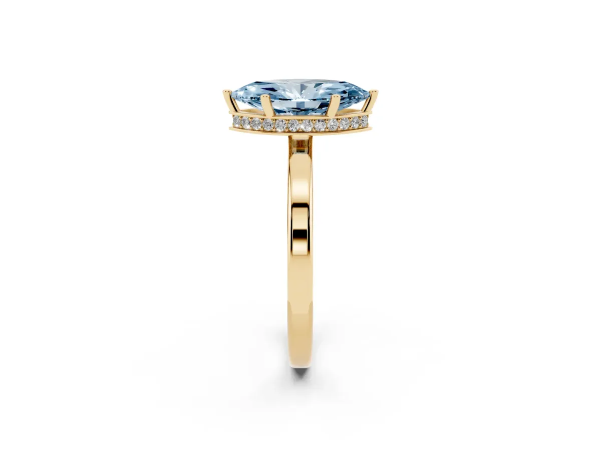 Fancy Blue Marquise Cut Cut Solitaire Engagement Ring with Four-Prong Setting on a Classic Band Yellow gold