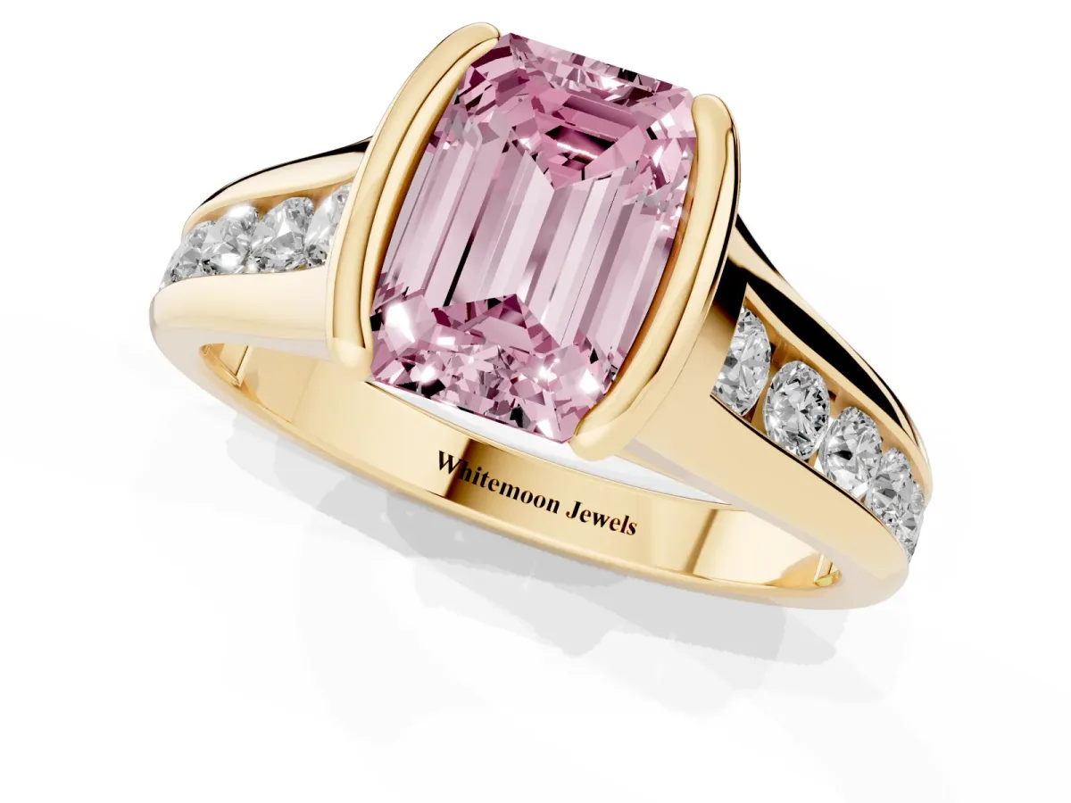 Fancy Pink Emerald Cut Solitaire Bezel-Set Diamond Ring with Channel-Set Band Yellow gold
