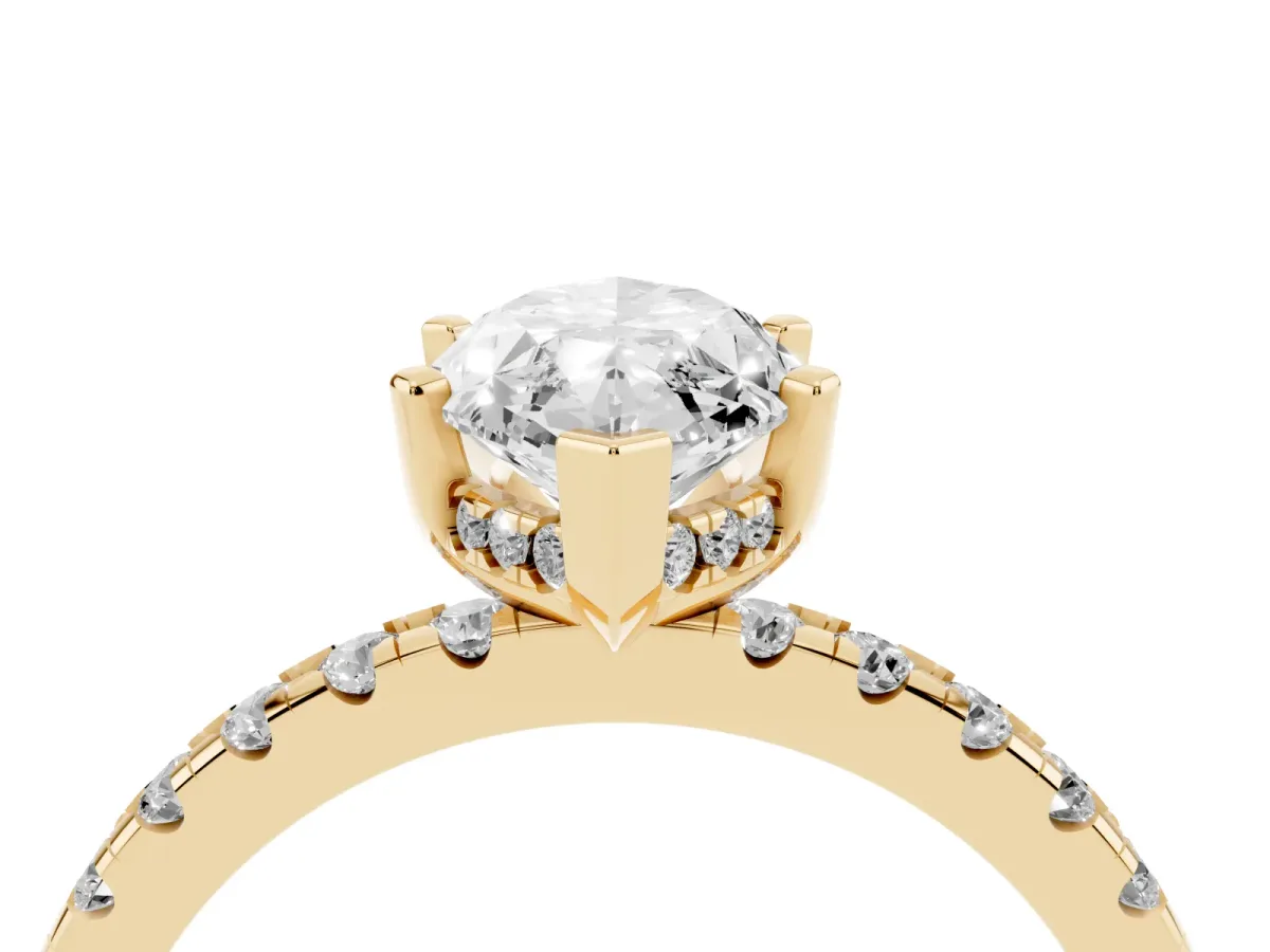 Marquise Cut Diamond Solitaire Ring with Round Pavé Band and Four-Prong Setting Yellow gold