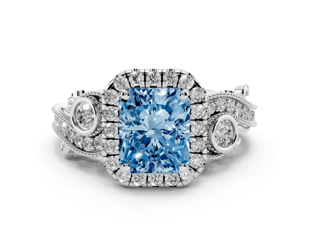 Fancy Blue Radiant Cut Halo Diamond Ring with Milgrain and Bezel Accents on a Split Shank Band Platinum