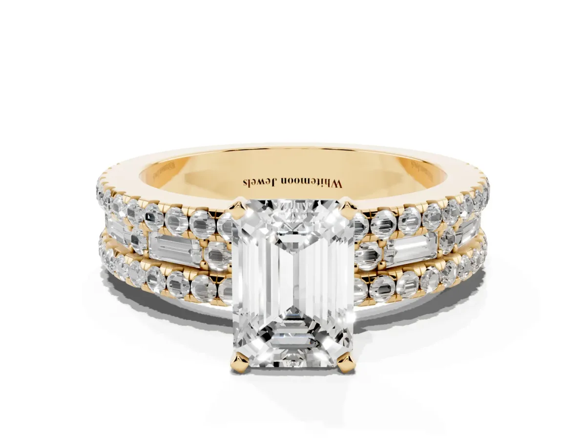 Emerald Cut Diamond Solitaire Ring with Pavé and Channel Set Band Yellow gold