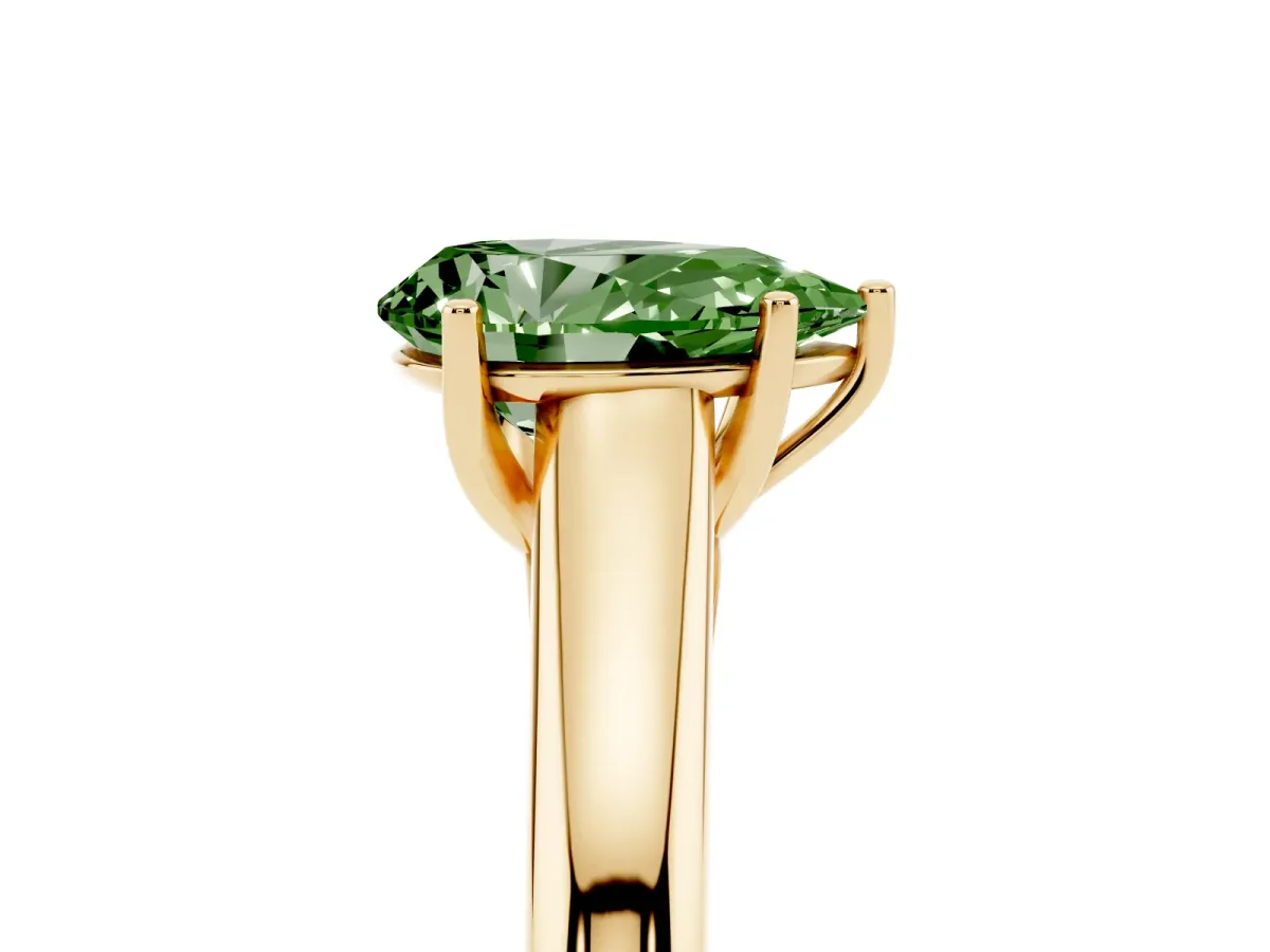 Fancy Green Pear Cut Solitaire Engagement Ring with Tapered Band and Four-Prong Setting Yellow gold