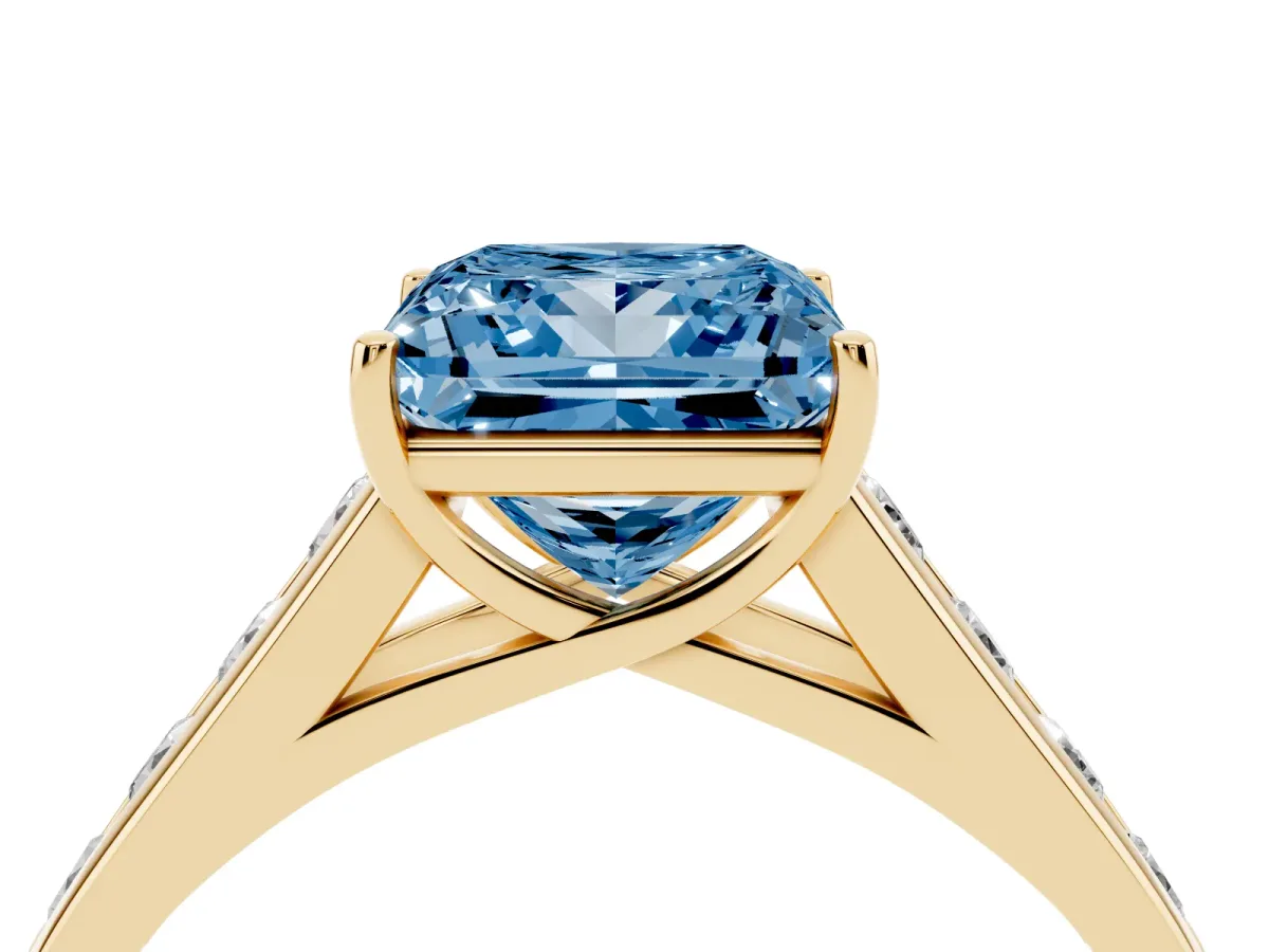 Fancy Blue Princess Cut Solitaire Channel-Set Diamond Engagement Ring with Four-Prong Setting Yellow gold