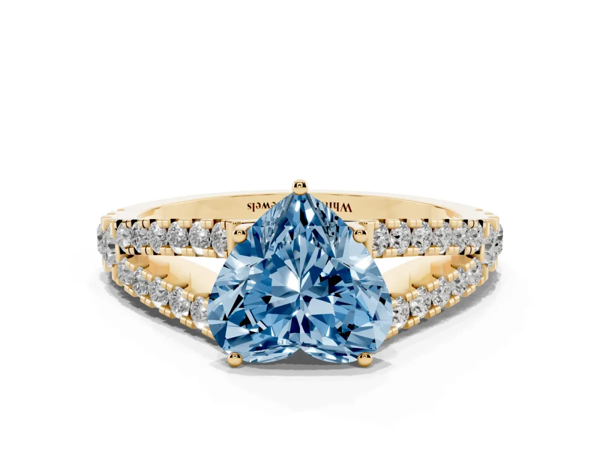 Fancy Blue Heart Cut Diamond Split Shank Engagement Ring with Round Pavé and Prong Setting Yellow gold
