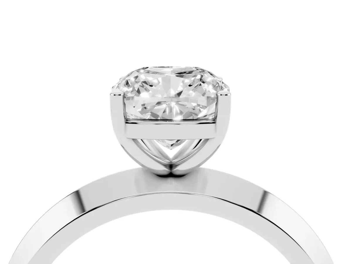 Cushion Cut Cut Solitaire Engagement Ring with Flat Band and Four-Prong Setting Silver
