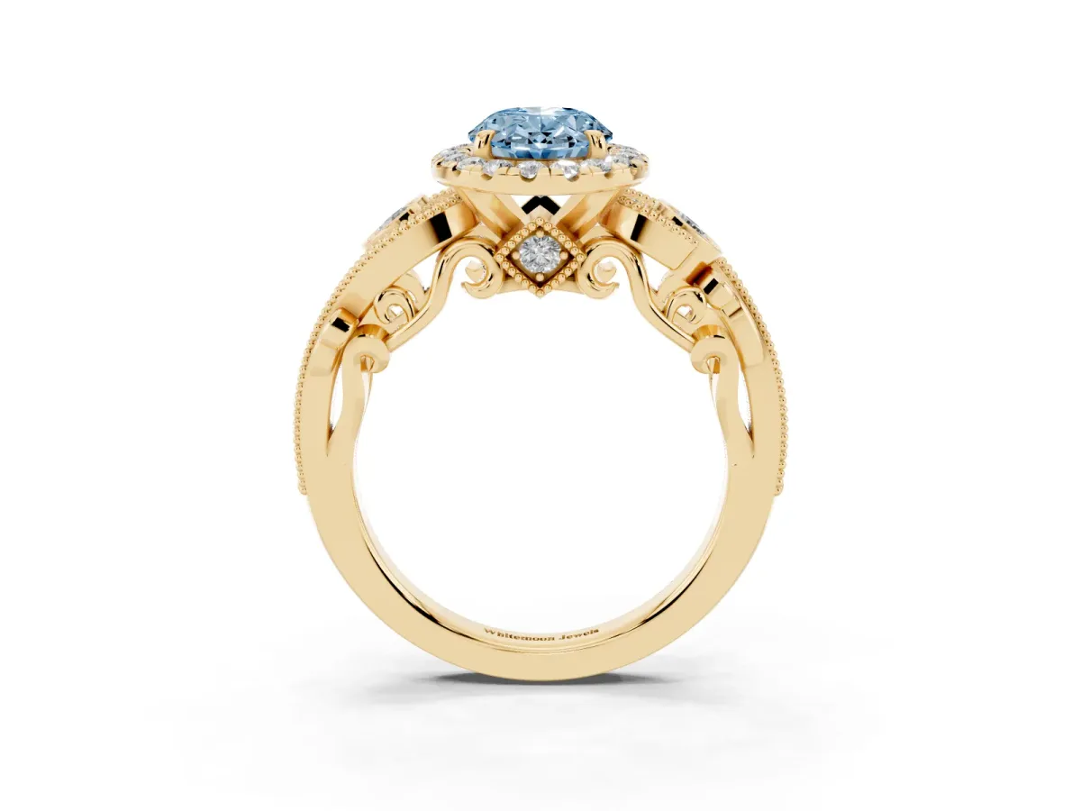 Fancy Blue Oval Cut Diamond Halo Ring with Milgrain Pavé Band and Four-Prong Setting Yellow gold